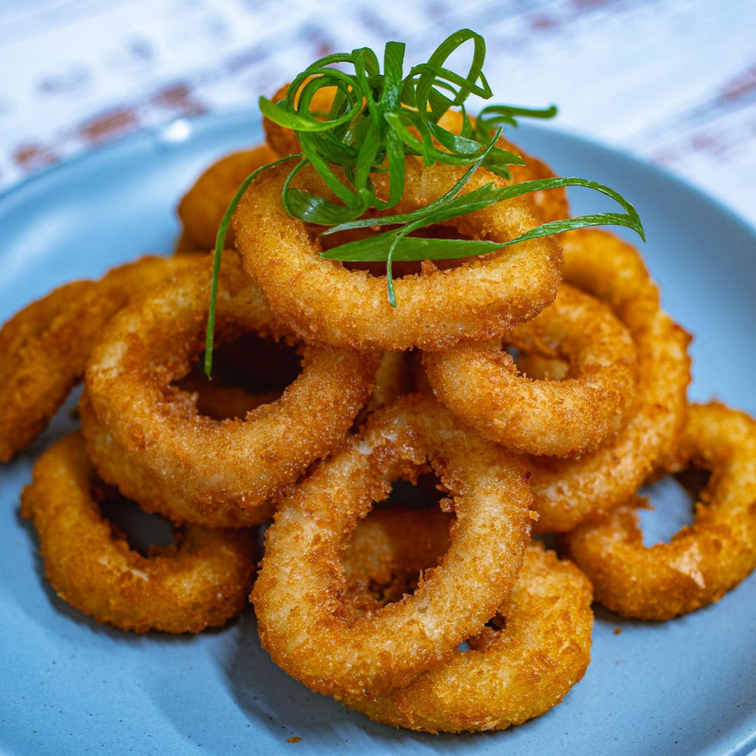 Fried squid rings breaded with lemon on a plate - Stock Photo [88050611] -  PIXTA